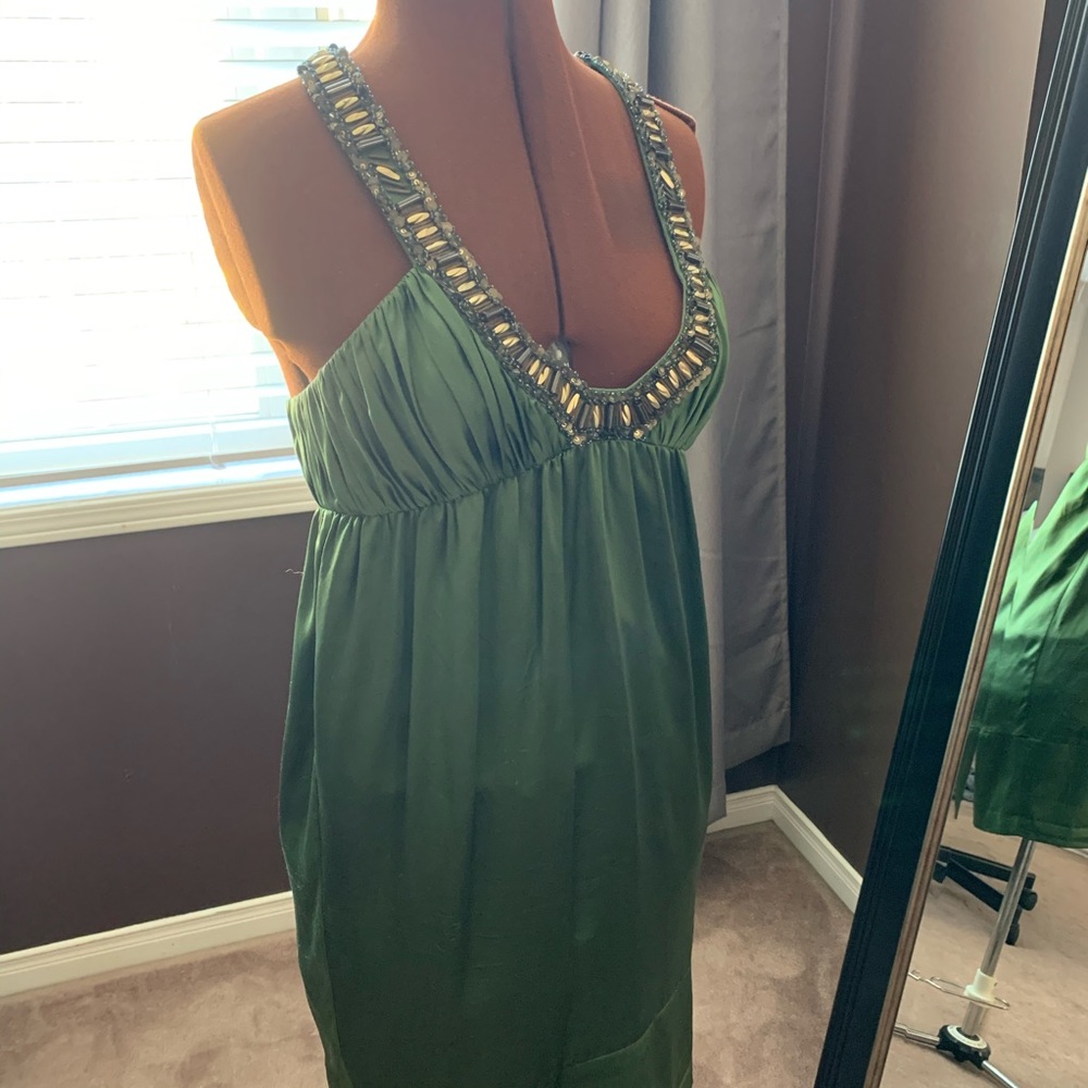 Green knee-length beaded dress